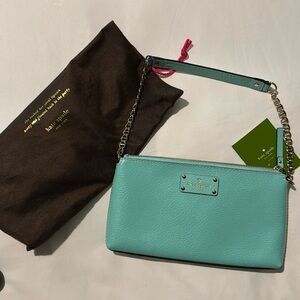 New with tags small leather Kate Spade wellesley Blue with golden chain